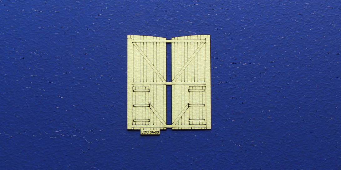 LCC 04-03 OO gauge double sided door type 1 with smaller door Double sided round style door. Compatible with LCC 04-00. Fold in half along hinge to create double sided door.